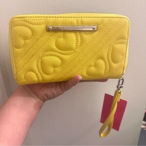 Betsey Johnson Heart-Embossed Yellow Wristlet